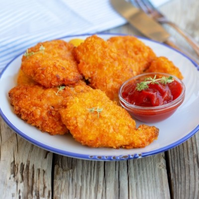 Snitel de curcan in fulgi de porumb